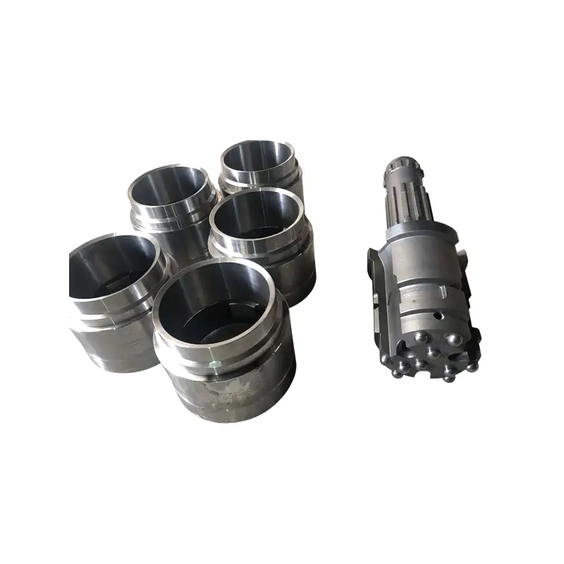 rock drilling concentric casing system with ring bits