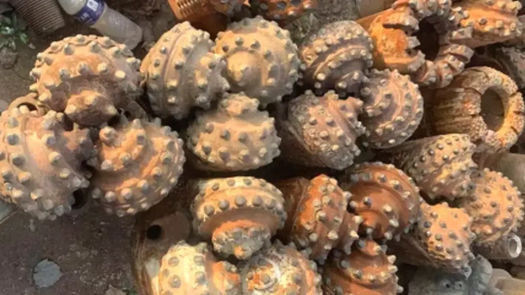 worn rock drill bits
