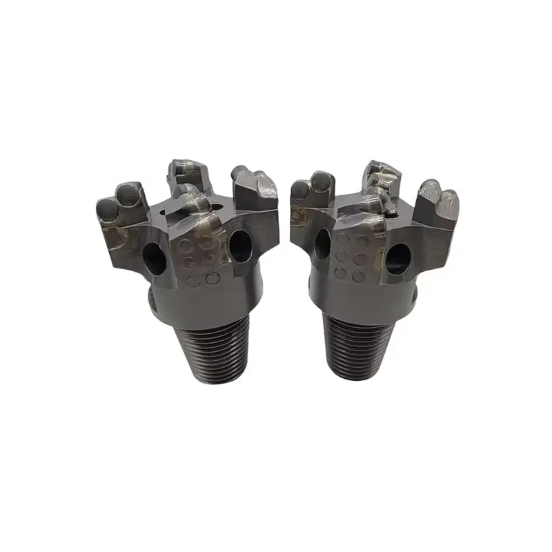 four wing stepped recessed drill bit