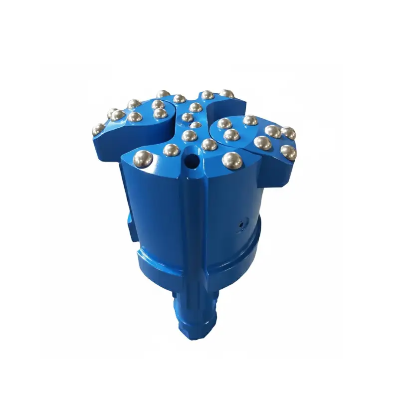 concentric casing drill bit symmetrix casing system with blocks